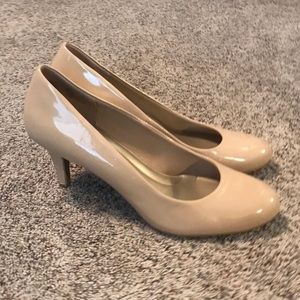 Nude-colored pump heels